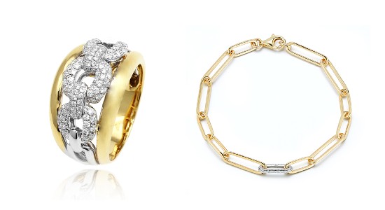 a mixed metal fashion ring with chain and diamond details next to a chain bracelet with a diamond studded link