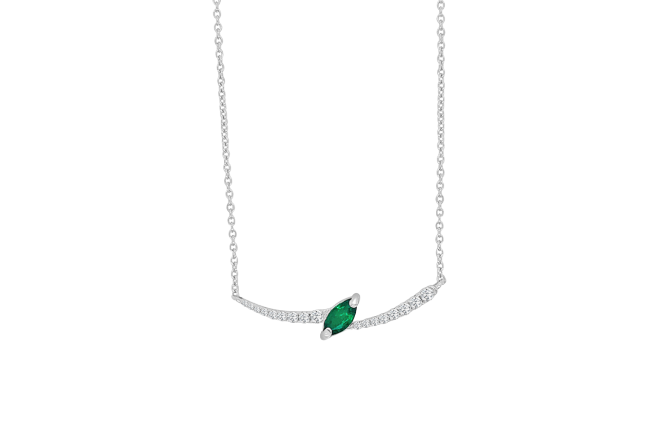 A white gold diamond necklace with a diamond shaped green gemstone in the center.
