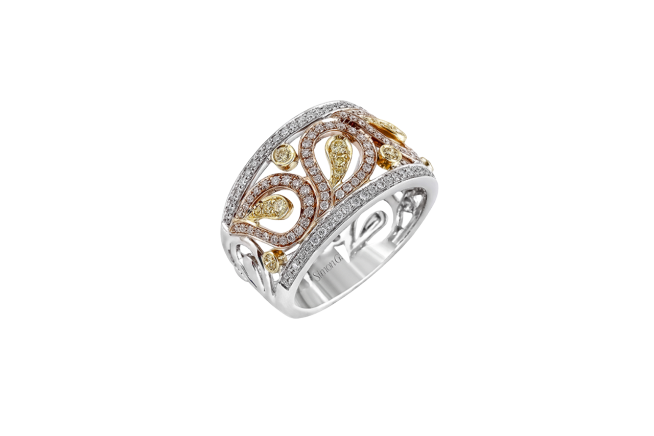 A mixed-metal diamond ring with intricate details and shapes.