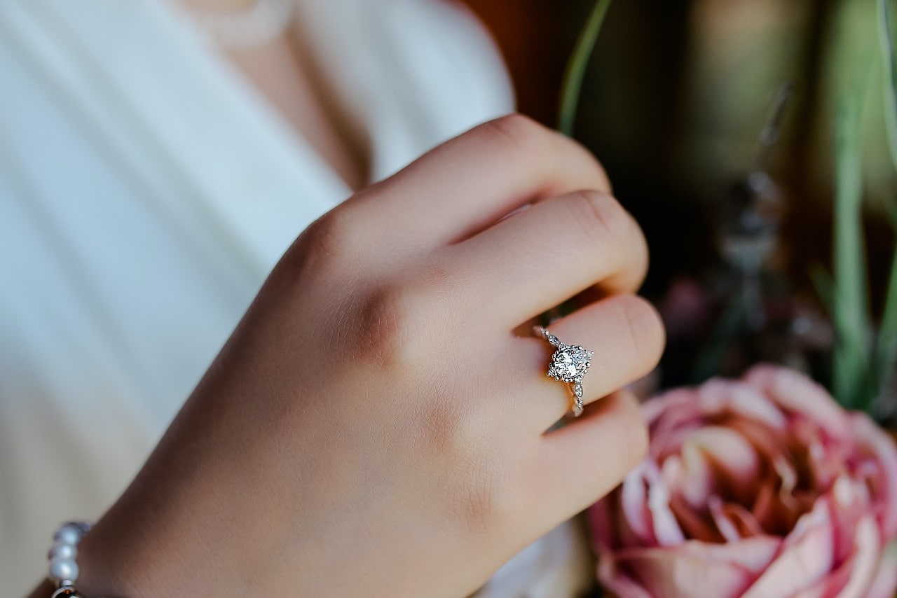A marquise diamond with side stone diamonds