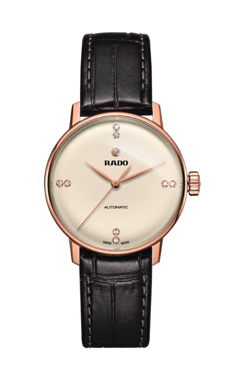 A leather strap wrist watch with beige dial