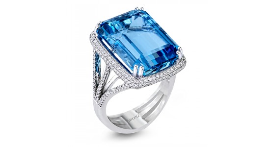 a dramatic white gold cocktail ring featuring vibrant aquamarine