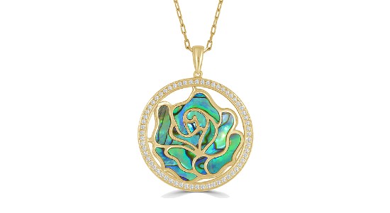 a yellow gold pendant necklace featuring green and blue shell material