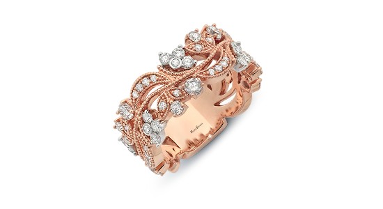 a rose gold fashion ring featuring vintage details and diamonds