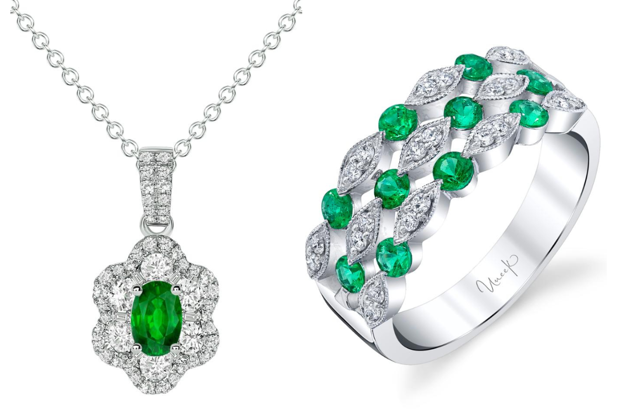 A combination of white gold diamond emerald and diamond necklace and a ring to match.