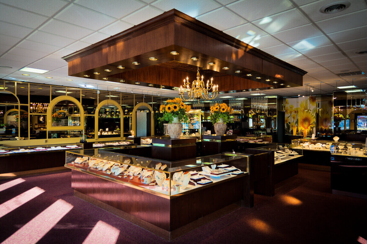 A wide view of Michael Agnello Jewelers’ luxurious showroom on a bright day.
